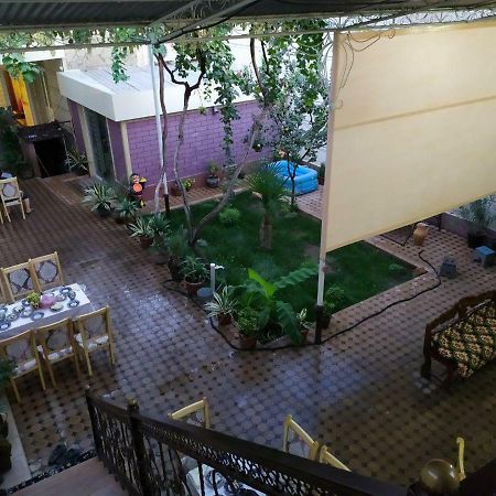 Uvaysiy Family Guest House Marghilon Bagian luar foto