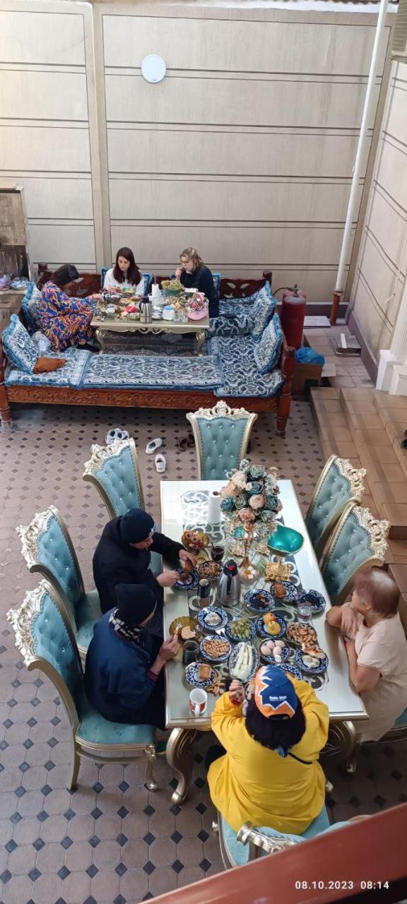 Uvaysiy Family Guest House Marghilon Bagian luar foto