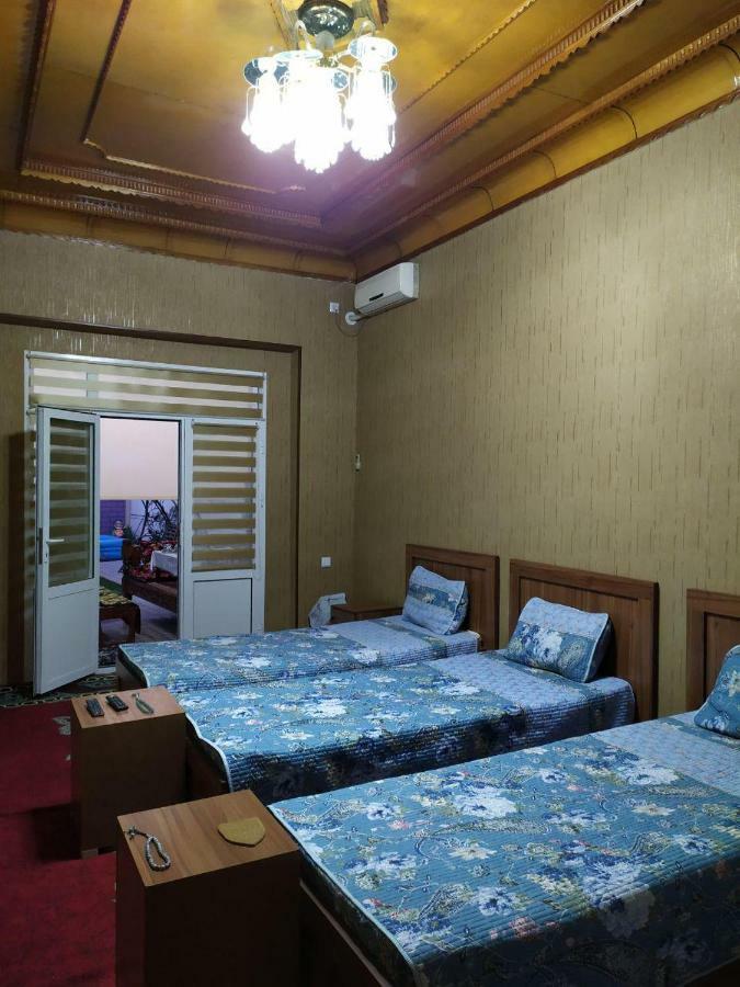 Uvaysiy Family Guest House Marghilon Bagian luar foto