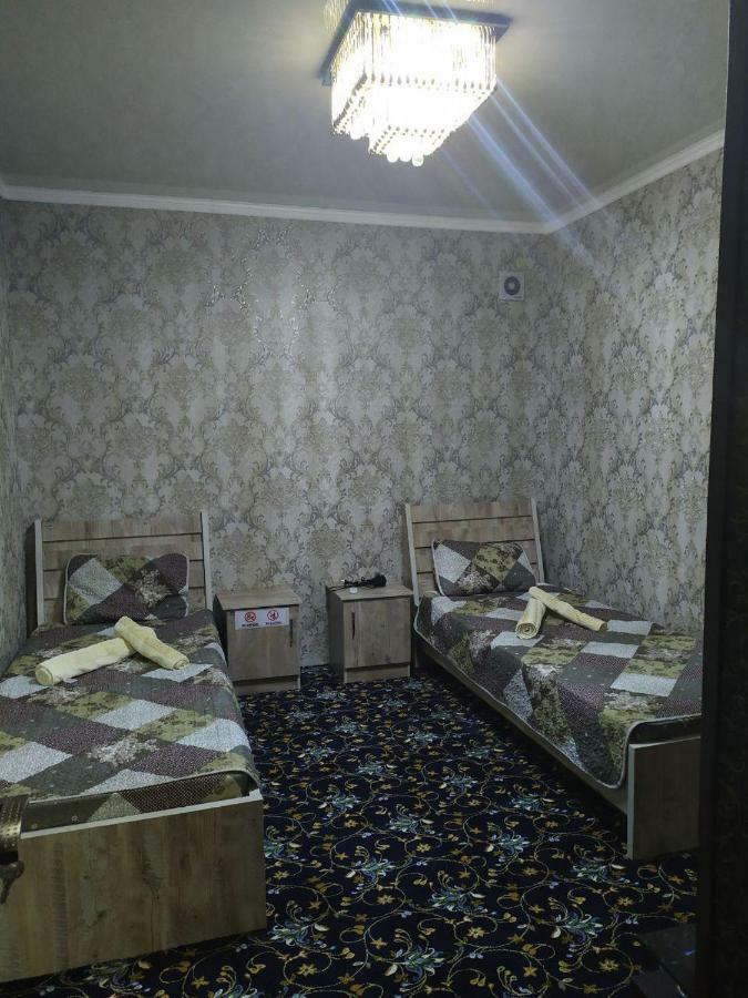 Uvaysiy Family Guest House Marghilon Bagian luar foto