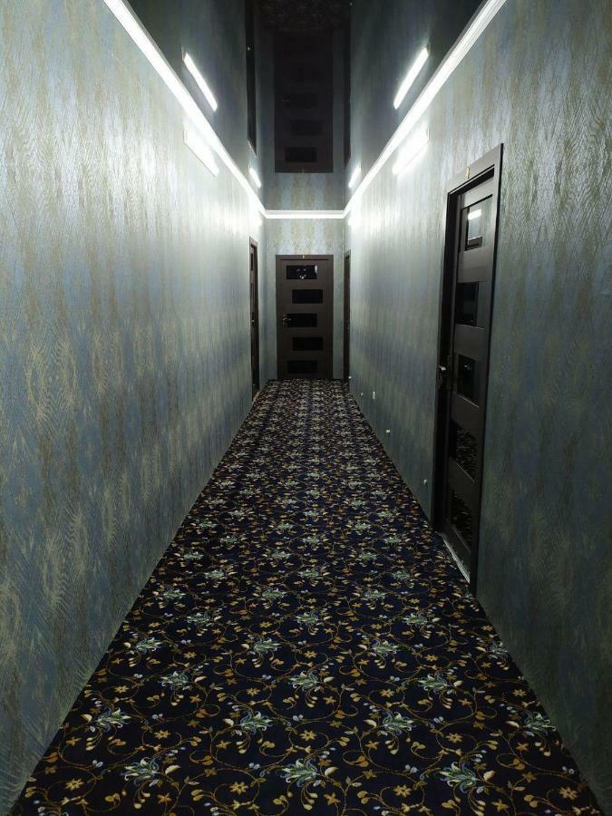 Uvaysiy Family Guest House Marghilon Bagian luar foto