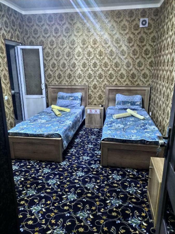 Uvaysiy Family Guest House Marghilon Bagian luar foto