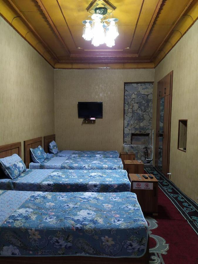 Uvaysiy Family Guest House Marghilon Bagian luar foto